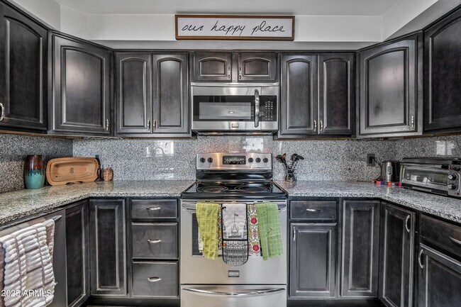 Building Photo - 7940 E Camelback Rd