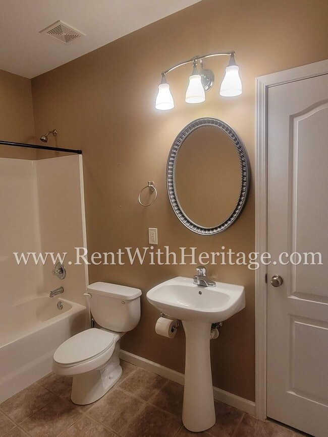 Building Photo - Gorgeous 3-Story Brick Home / 2 Fireplaces / Full Finished Basement / Chapel Hill Schools