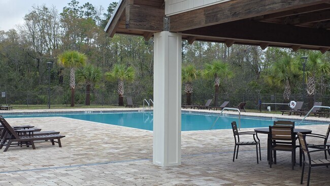Building Photo - New Home in Sawmill Creek 3 Bedroom 3 Bath home with Office/Den and Screened Patio