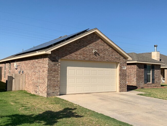 Building Photo - Solar Panels and Alarm System Included!!