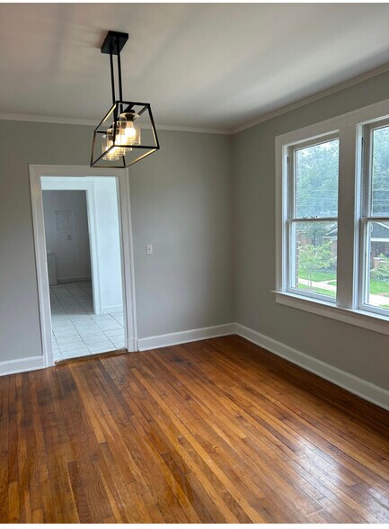 Dining room looking into breakfast room then kitchen - 768 Acosta St