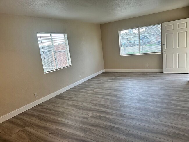 Building Photo - This cute home won't last long with a new ...