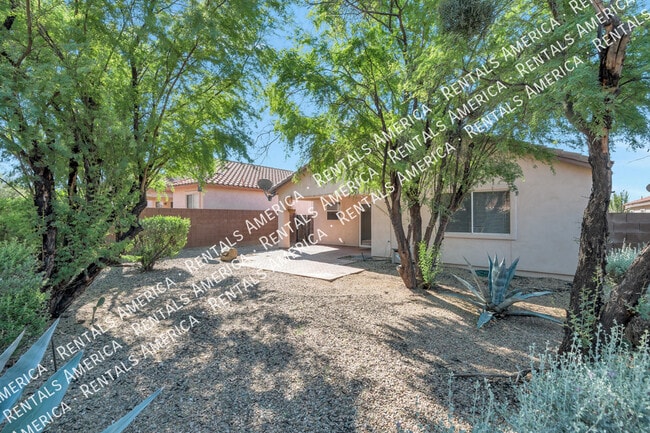 Building Photo - 5568 W Peaceful Dove Pl