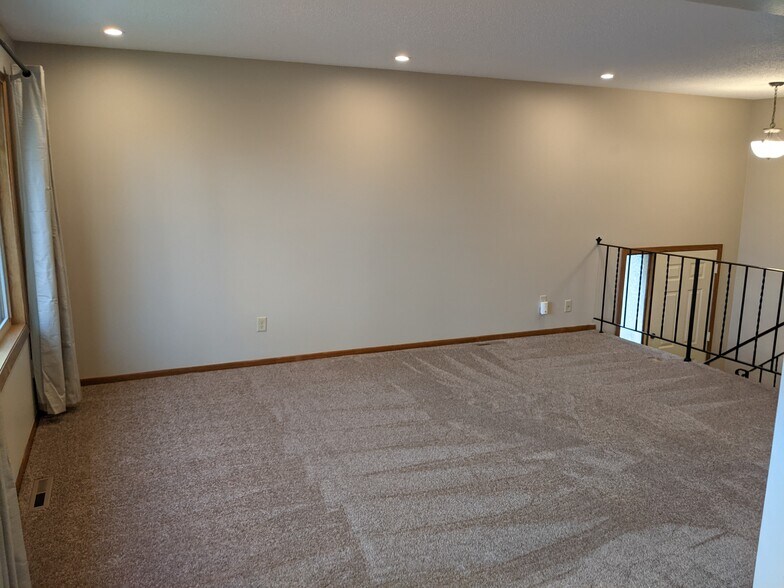 Upper level living room - 7644 Woodlawn Dr
