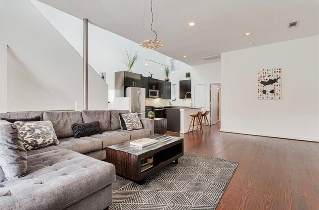 Building Photo - Modern Loft w/ Rooftop Deck & Downtown Vie...