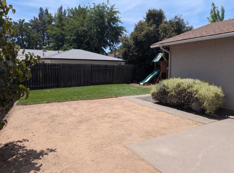 Backyard with low maintenance artificial turf and DG surface. Playground can be removed. - 3006 Campbell Pl