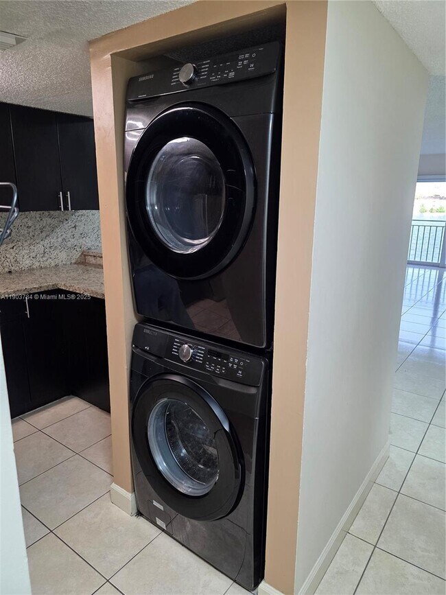 Building Photo - 9917 W Okeechobee Rd