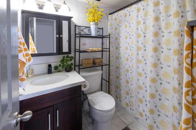 Full Bath with a tub and Shower - 2440 Date St