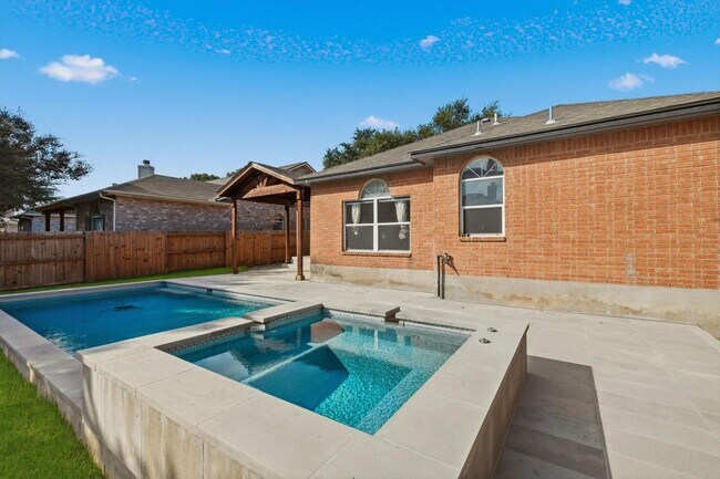Building Photo - Your Backyard Oasis—Pool & Lawn Service Included