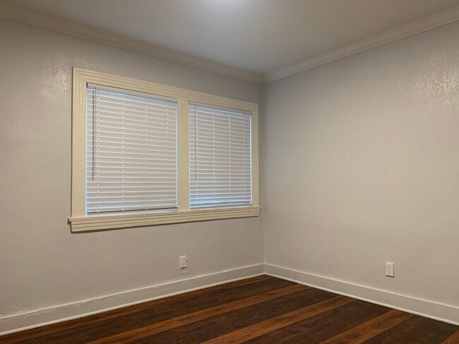 Building Photo - Great Experiences Are Just Around Rolland Curtis!