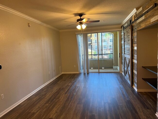 Building Photo - Spacious 3BR/2BA Gated Condo with Resort-Style Amenities!