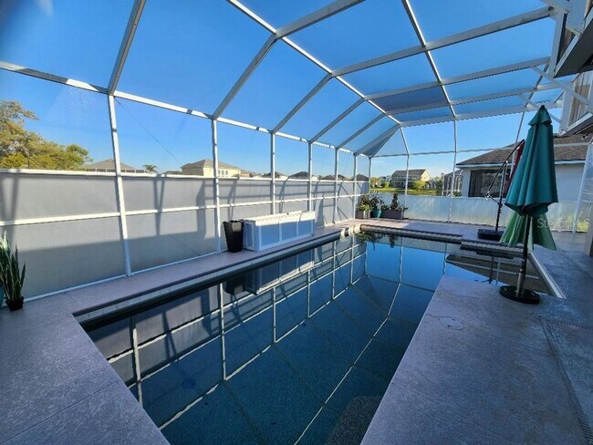 Building Photo - Beautiful Port Orange 4 Bedroom 2 Bathroom Pool Home