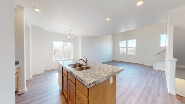 Building Photo - Going, Going... Almost Gone! One Brand New Townhome Left