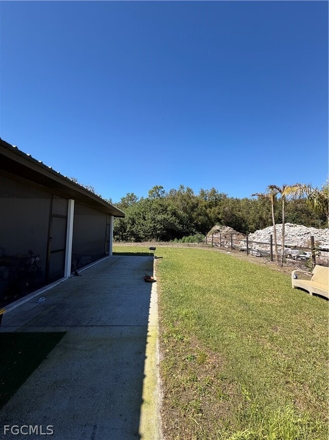 Building Photo - 11621 Tomato Rd