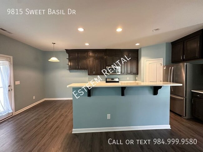 Building Photo - 9815 Sweet Basil Dr