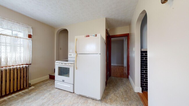 Building Photo - Country living! 1st floor laundry 3+ car garage with work shop