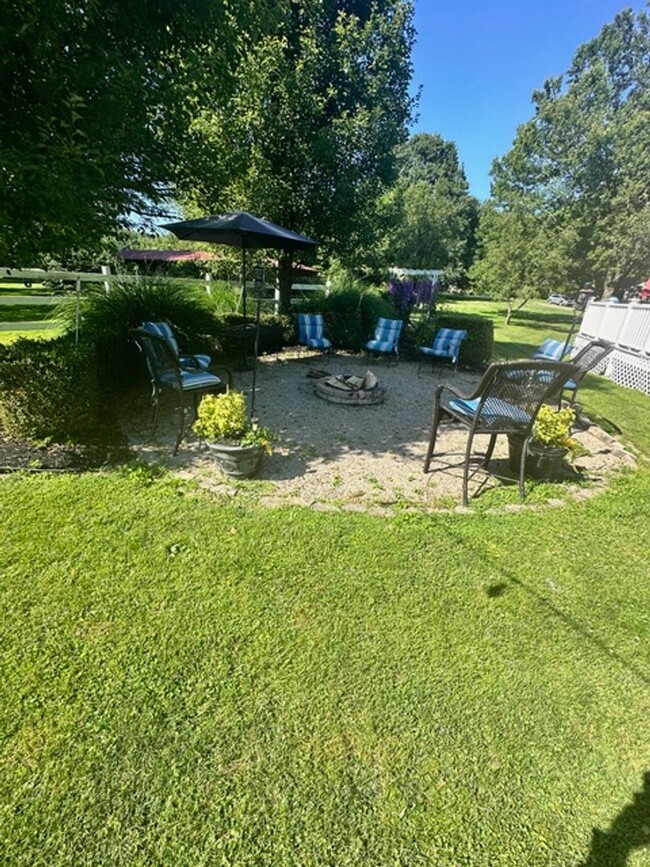 Building Photo - 5 Bedroom 2 1/2 Bath Home w/ Wrap Around P...