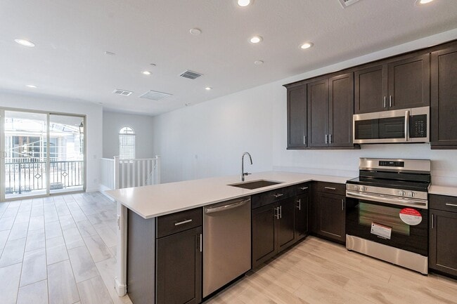 Building Photo - 2024 Luxury Townhome | 2-Car Garage, Quartz Kitchen & Resort Pool