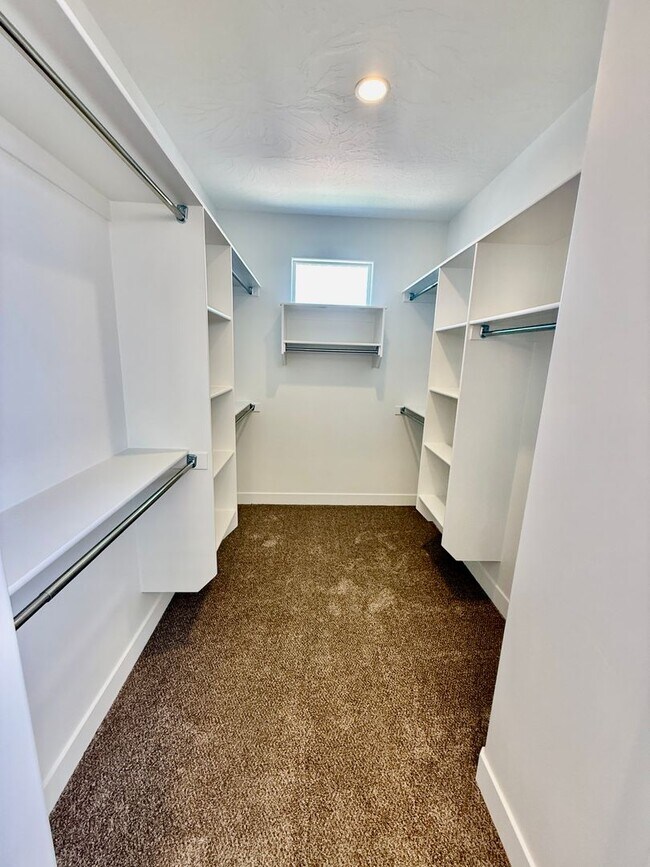 Building Photo - BRAND NEW Three Bedroom Townhome in Desert...