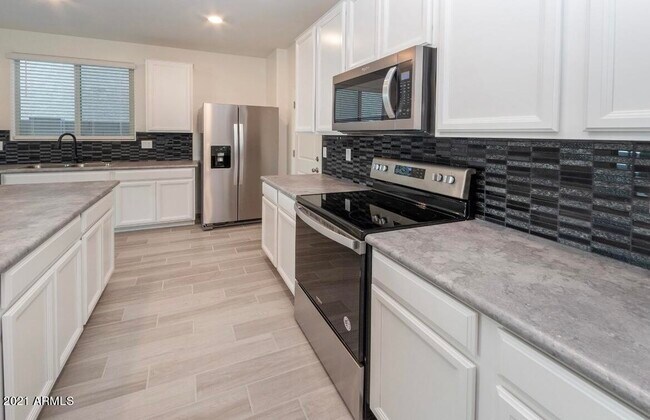 Building Photo - 7255 N 125th Dr