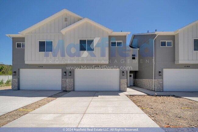 Building Photo - Interior New Townhouse - 3BD 3BA 2GA