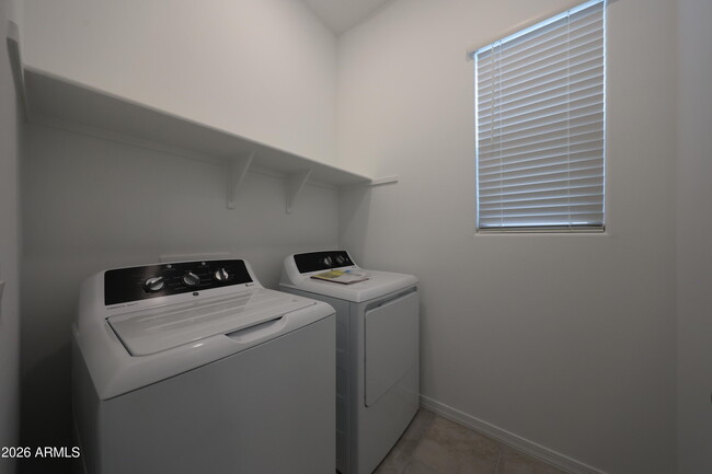 Building Photo - 7683 W Smoketree Dr