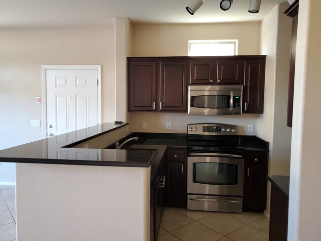 Kitchen with stainless steel appliances - 17150 N 23rd St