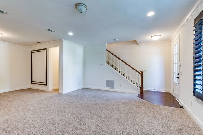 Building Photo - Welcome to this charming end unit townhome