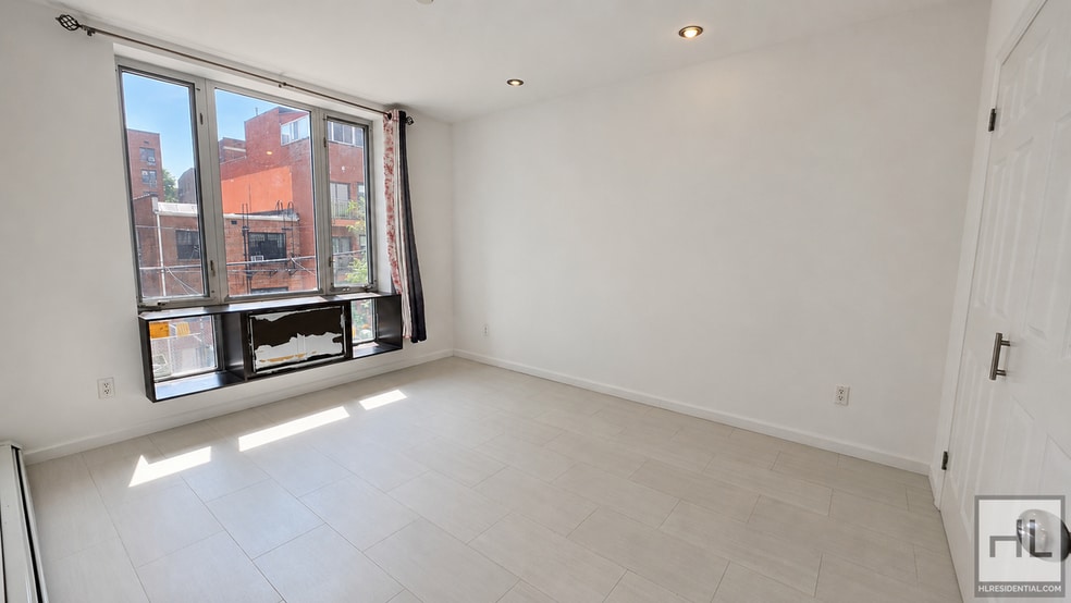 Building Photo - Second-Floor Apartment on Britton Ave – Elmhurst, NY