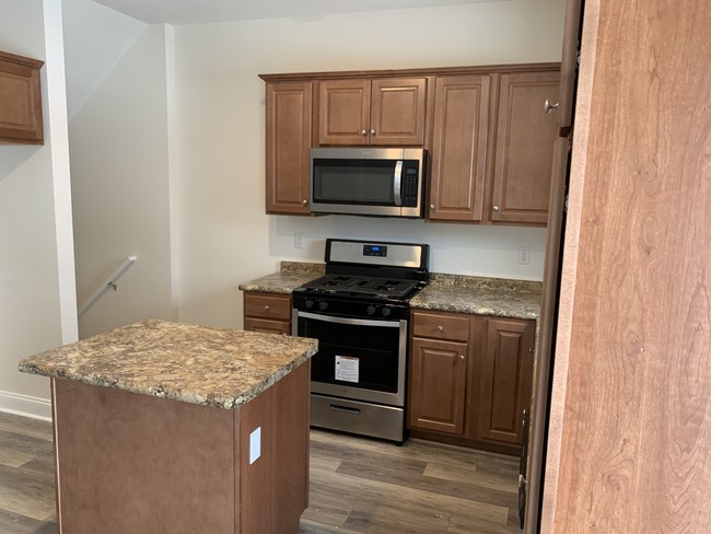 Kitchen w Walnut Cabinets - 4341 W 26th St