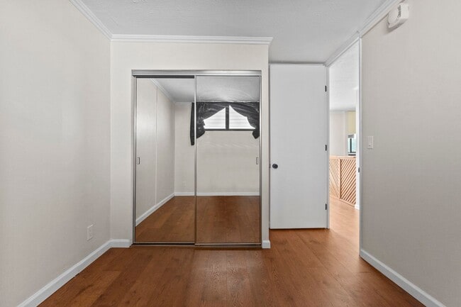 Building Photo - Wake Up to Stunning Mountain & Ala Wai Canal Views in the Heart of Waikiki