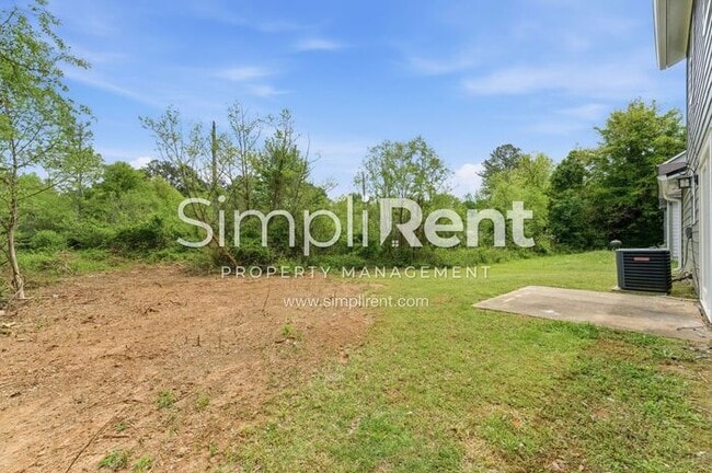 Building Photo - Updated Home with Spacious Layout & Private Backyard