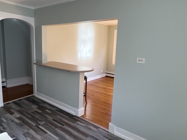 Standing in Kitchen looking into living room - 55 Ontario St