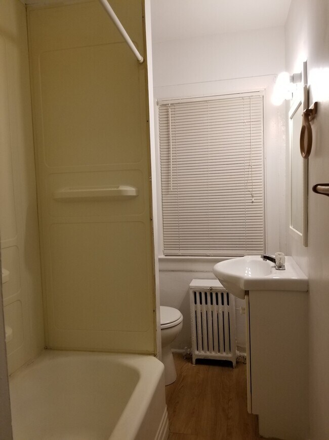 Building Photo - Wood floors, fresh paint, coin laundry, shared yard