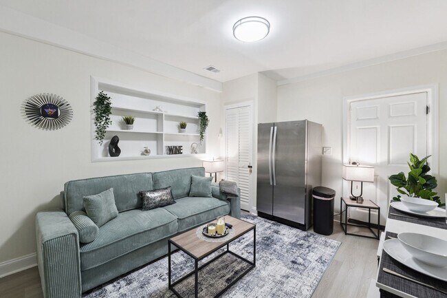 Building Photo - Fully Furnished: Beautiful 4-Bedroom Home ...
