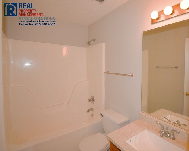 Building Photo - Great brick 3BD home near MTSU, attached 2 car garage & fenced-in back yard!