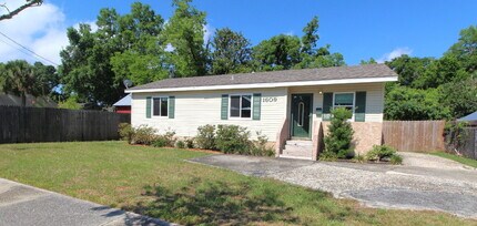 Building Photo - 3/2 with Updated Kitchen & Solar – Minutes...