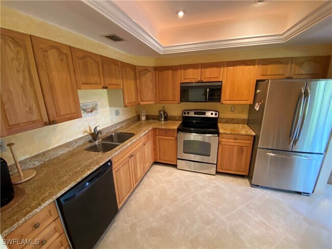 Building Photo - 6760 Pelican Bay Blvd