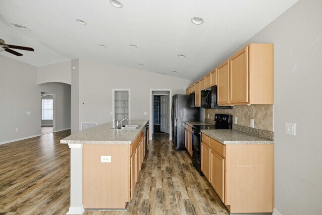 Building Photo - 4BR Gated Community Home with Fenced Yard, 2-Car Garage & Open Floor Plan