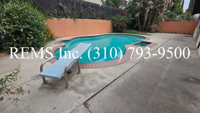 Building Photo - Large 4 Bedroom Single-Family Home with Pool & 2-Car Garage