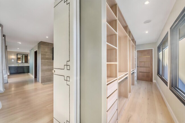 Primary Closet 1 of 3 - 7611 Rindge Ave