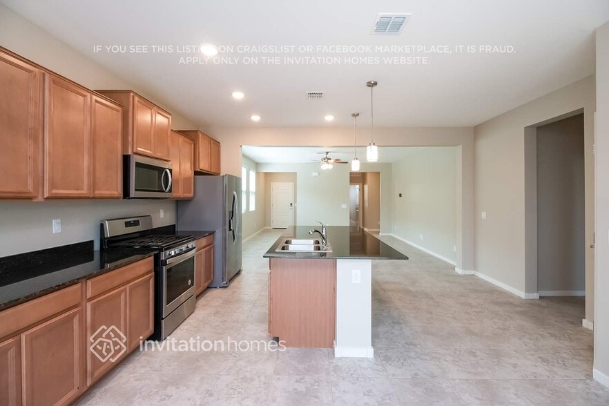 Building Photo - 33987 N Desert Star Dr