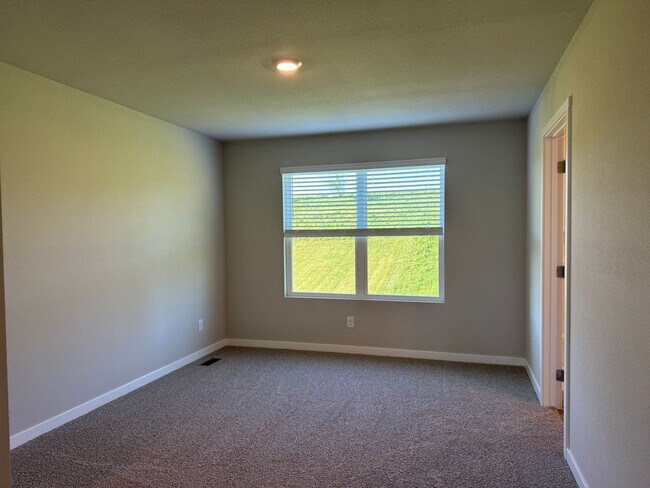 Building Photo - Spacious 4-Bedroom Split-Level Near Standing Bear Lake & Trails