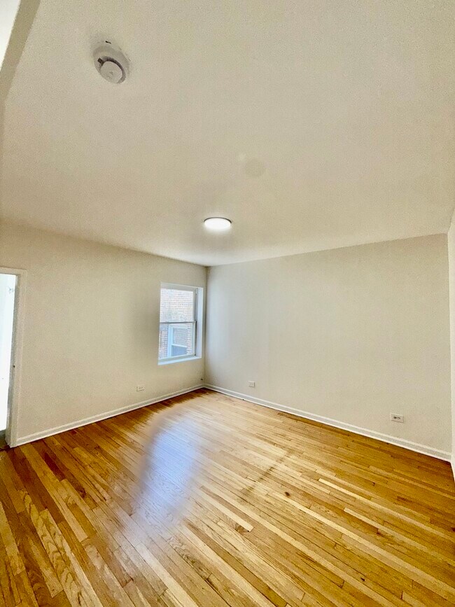 Building Photo - 7833 S Colfax Ave