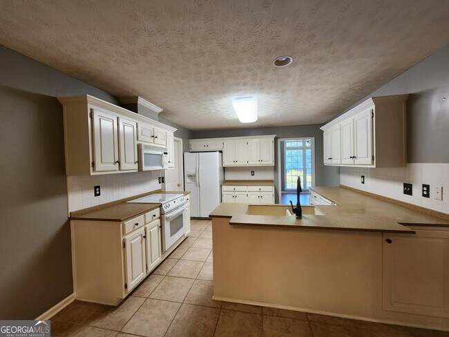 Building Photo - 7184 Village Loop