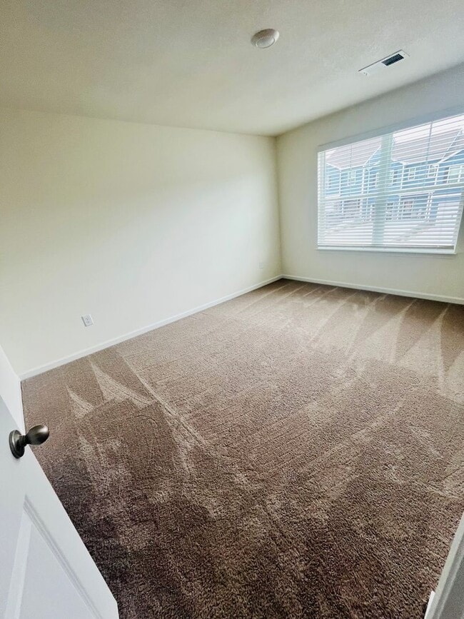 Building Photo - Be the First to Call This Brand New Townho...