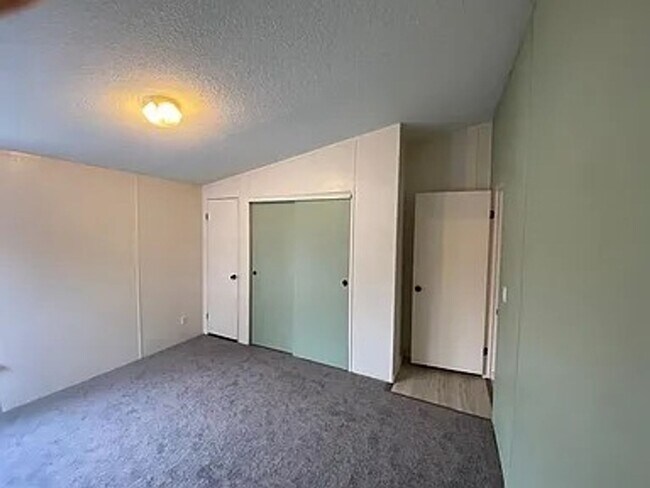 Building Photo - Charming 3 Bedroom Home in Quiet, Tree Lined Neighborhood