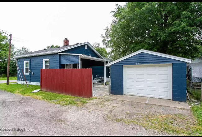 Covered side porch and garage - 3100 Montana Ave