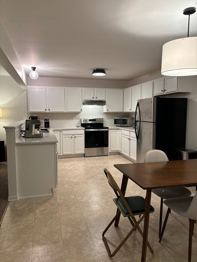 Eat-in kitchen and living room to the side - 2218 Patrick Ln