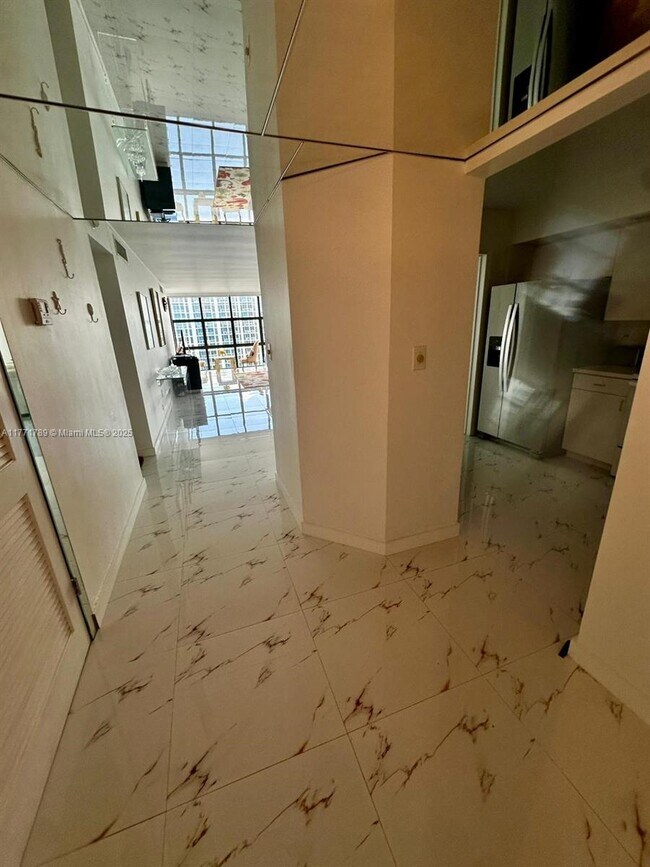 Building Photo - 6423 Collins Ave